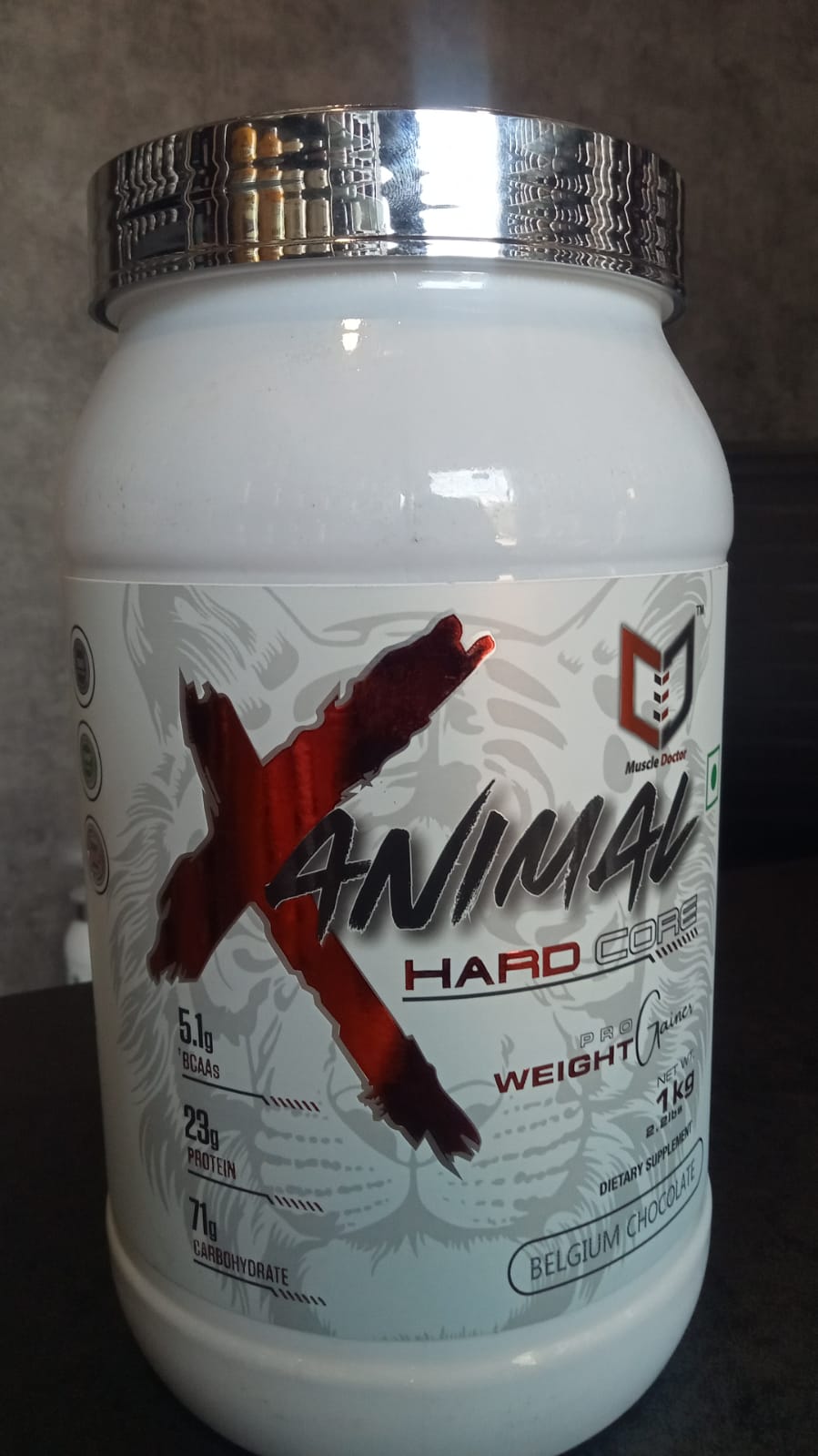 Muscle Doctor Hard core weight & mass gainer, High Protein High Calorie Weight Gainers/Mass Gainers (1kg, BELGIUM CHOCOLATE)